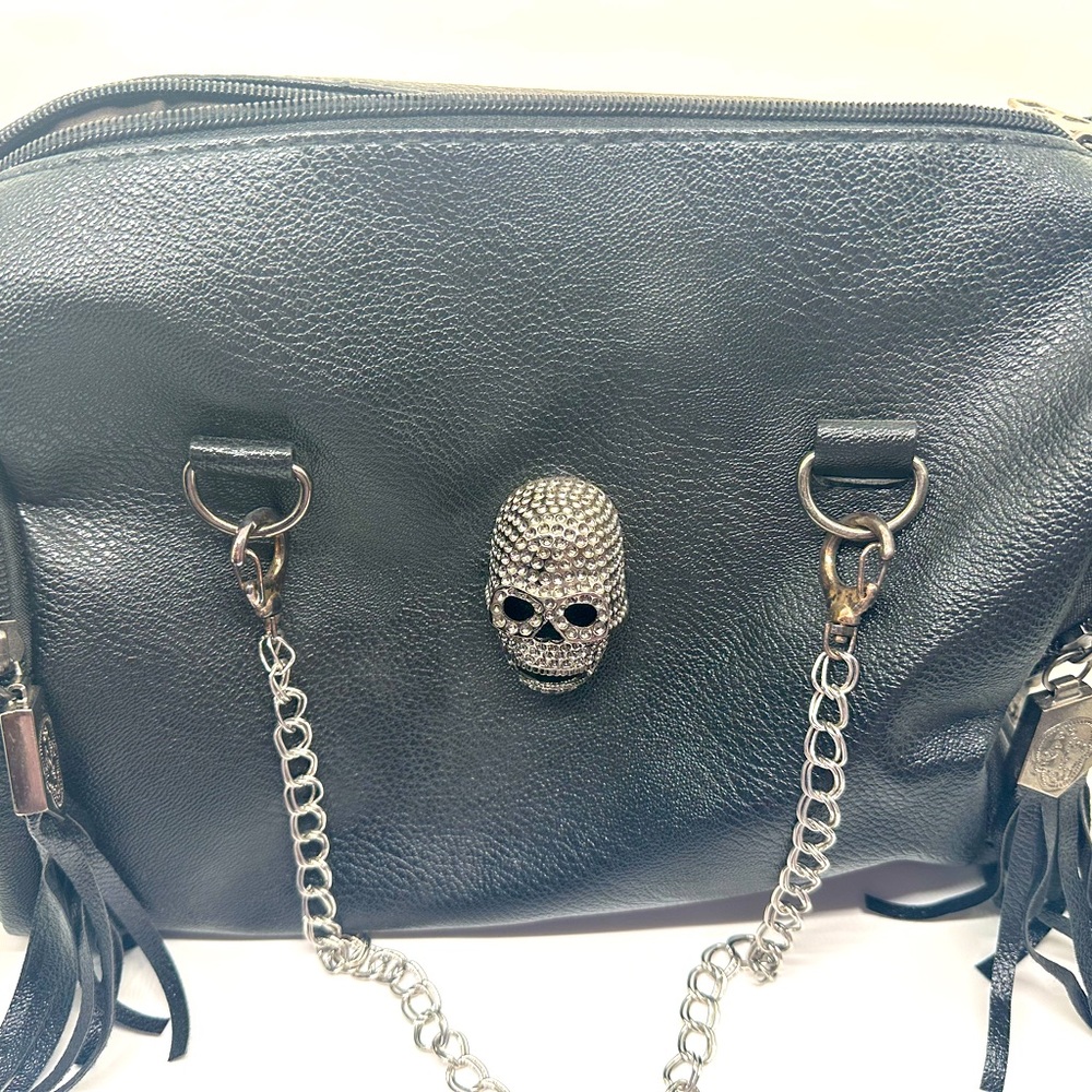 Skull bag studded. Black leather